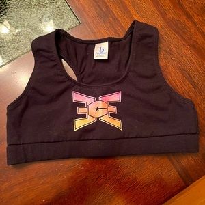 Girls size medium (10-12) black ECE sports bra with ombré letters. Never worn